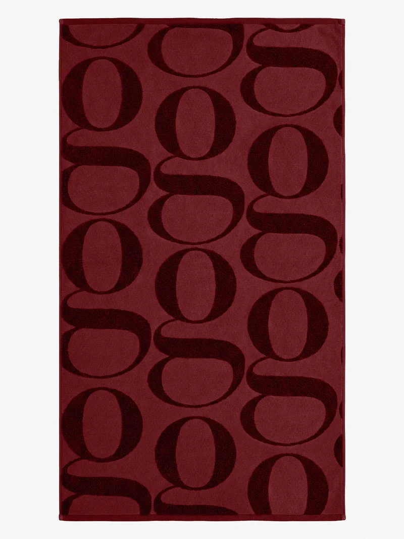 Toalla 100% algodón con jacquard logo gisela. 150 x 100 cm
