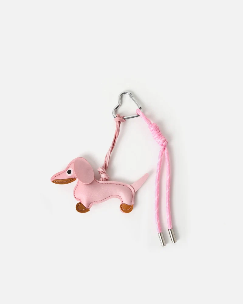 Buti llavero charm perro rosa